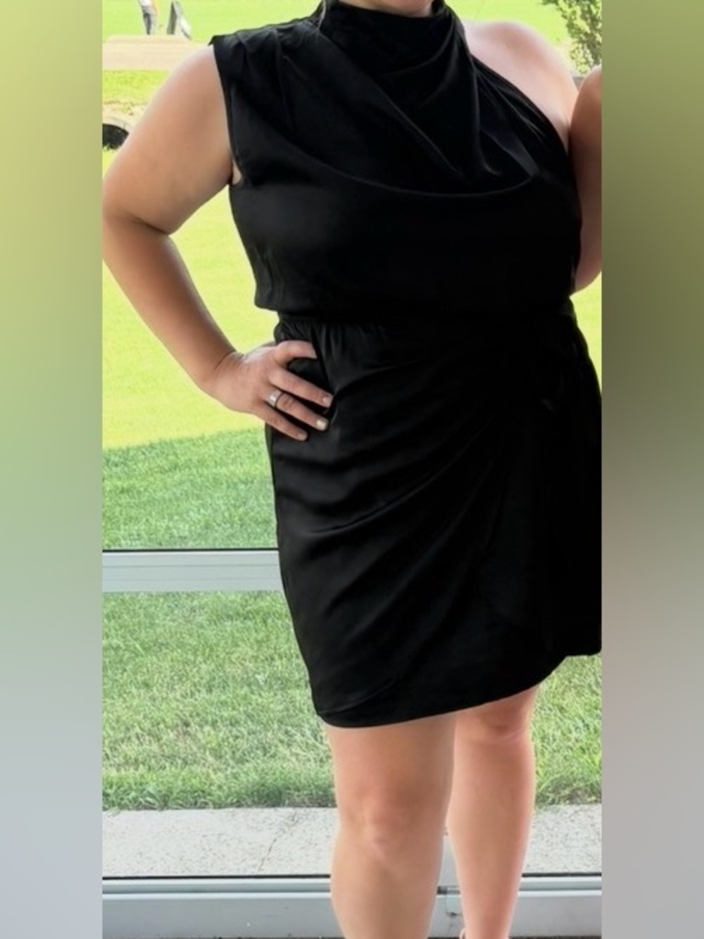 Sleek Black Mini Dress with Draped Neckline